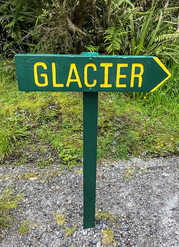 Franz Joseph Glacier Walk: The Cheapest Way to See the Franz Josef Glacier in New Zealand 7 Franz Josef Glacier Walk sign pointing to the New Zealand glacier