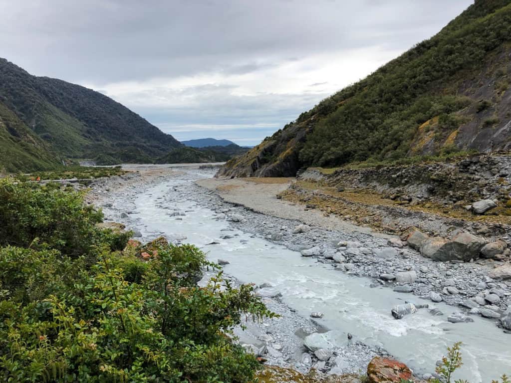 Franz Joseph Glacier Walk: The Cheapest Way to See the Franz Josef Glacier in New Zealand 10 Franz Josef Glacier Walk track with the rushing river