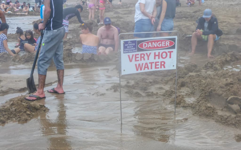 Hot Water Beach: A Guide to the Renowned Beach 3 Sign reading "Very Hot Water"