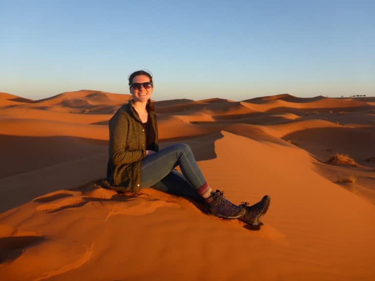 Is Marrakech Safe for Solo Female Travellers? 1 Nina sitting in the Moroccan desert