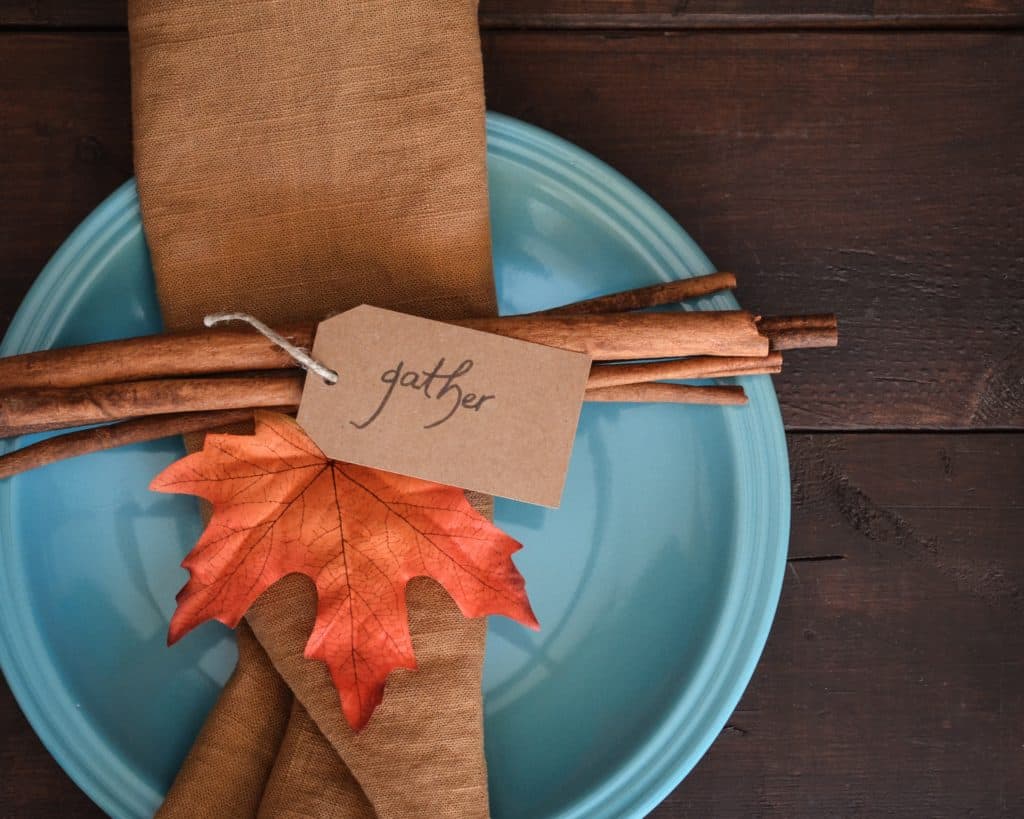 Canadian vs American Thanksgiving: What's the Difference? 3 Thanksgiving plate that has "gather" written on a tag