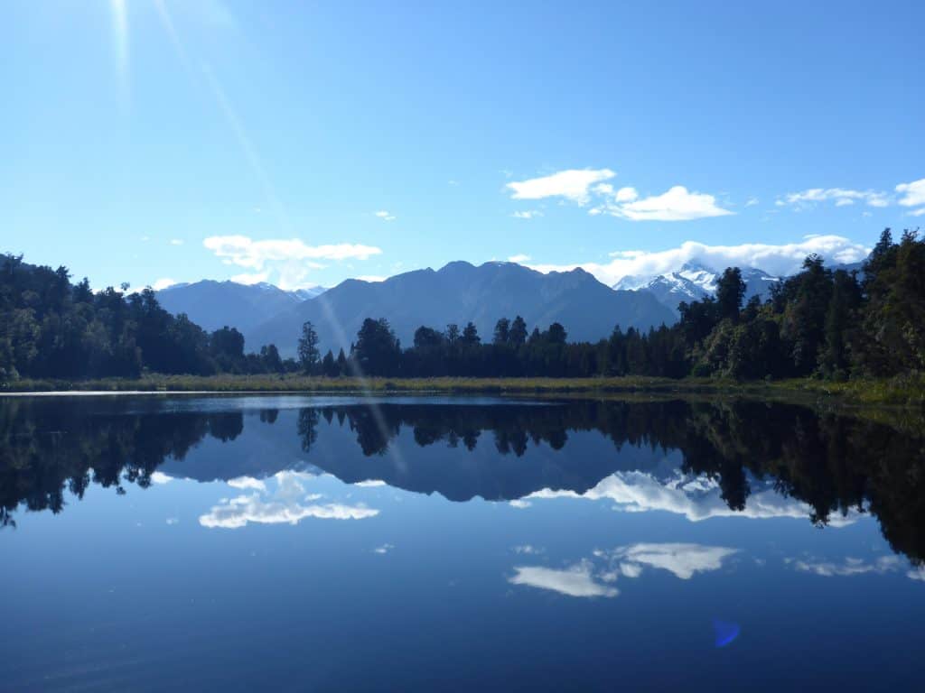 18 Best Things to Do In South Island of New Zealand 2024 10 Mount Cook's reflection at Lake Matheson