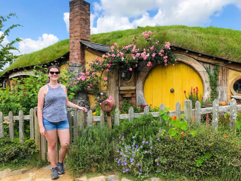 New Zealand working holiday visa - nina in front of Hobbiton