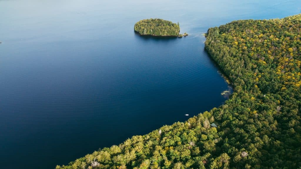 10 Best Things to Do in Mont Tremblant in Summer (2024) 6 Blue Lac Tremblant and greenery of the forests surrounding it in Mont Tremblant