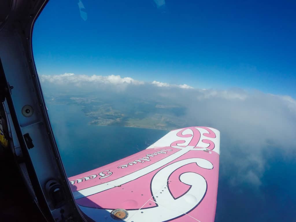 Skydiving in Taupo, New Zealand: 15,000 ft of Fun 3 View out of the airplane window as Skydive Taupo ascends to 15,000ft in New Zealand