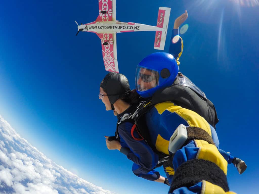 Skydiving in Taupo, New Zealand: 15,000 ft of Fun 6 Nina screaming as she and her tandem instructor freefall from the plane over Taupo, New Zealand