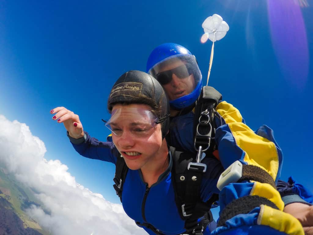 Skydiving in Taupo, New Zealand: 15,000 ft of Fun 8 Nina's skin pushed back as she freefalls over Taupo New Zealand