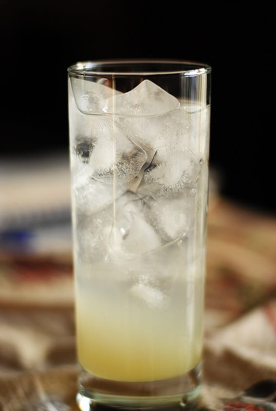 10 Delicious Canada Cocktail Recipes to Try (2024) 11 Tall glass with ice and Canadian slocum maple smash cocktail inside