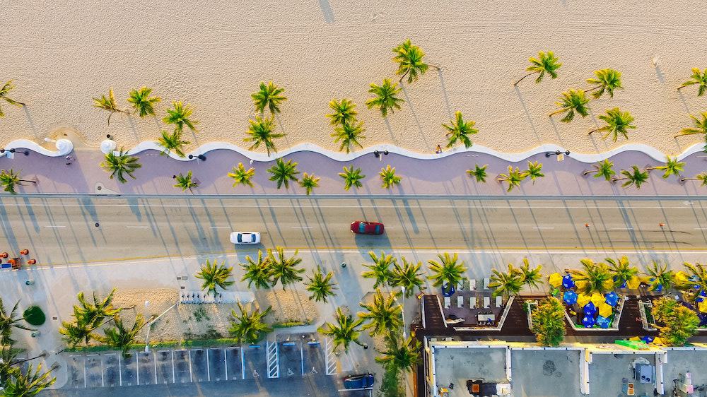 27 Best Weekend Getaways in the US 15 Aerial view of Miami beach and city street
