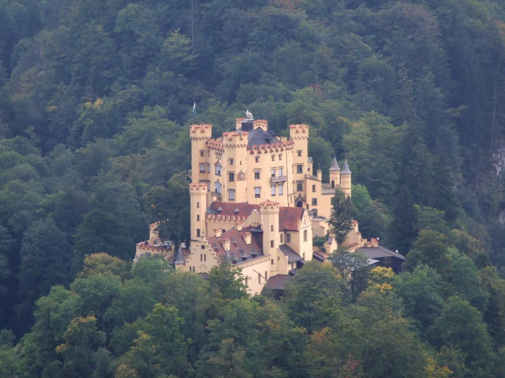 11 Fairytale Castles in Germany: Most Beautiful Castles to Tour 9 Drone shot of Hohenschwangau castle from above. Fairytale castle germany