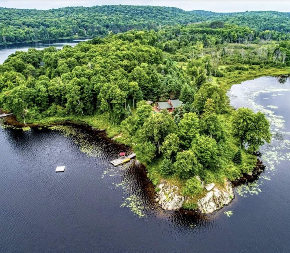 20 Cozy Cabins in Ontario for an Autumn Weekend Getaway 20 Private island with a cozy cabin nestled amongst the trees in Ontario, Canada