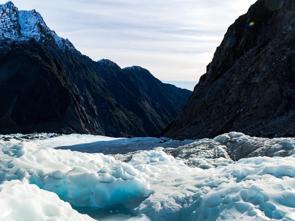 Ultimate New Zealand Bucket List: 79 Best Things to Do 2024 11 View of the Franz Josef Glacier from a bucket list heli hike