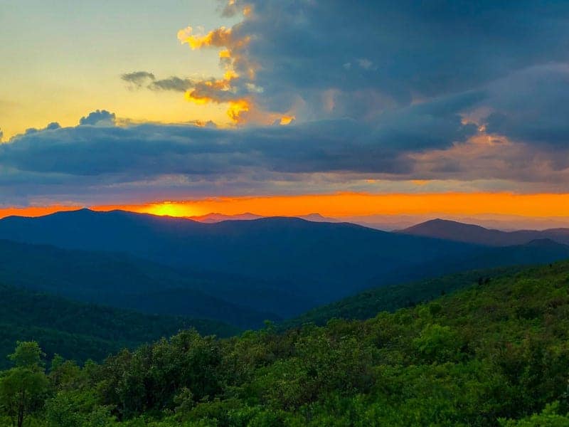 20 Most Beautiful States in the USA in 2024 4 Sunset over North Carolina's mountains and forests