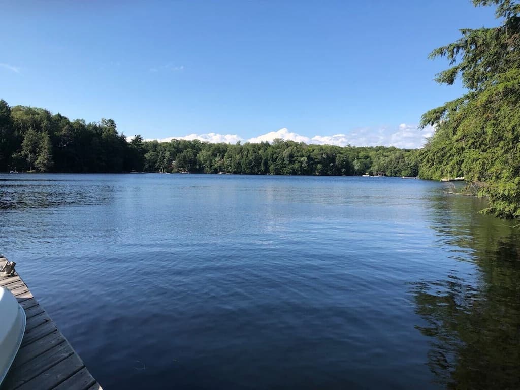 20 Top Airbnb Cottages in Muskoka for an Epic Getaway 14 Airbnb cottage on crane lake with a view of the water from the dock.