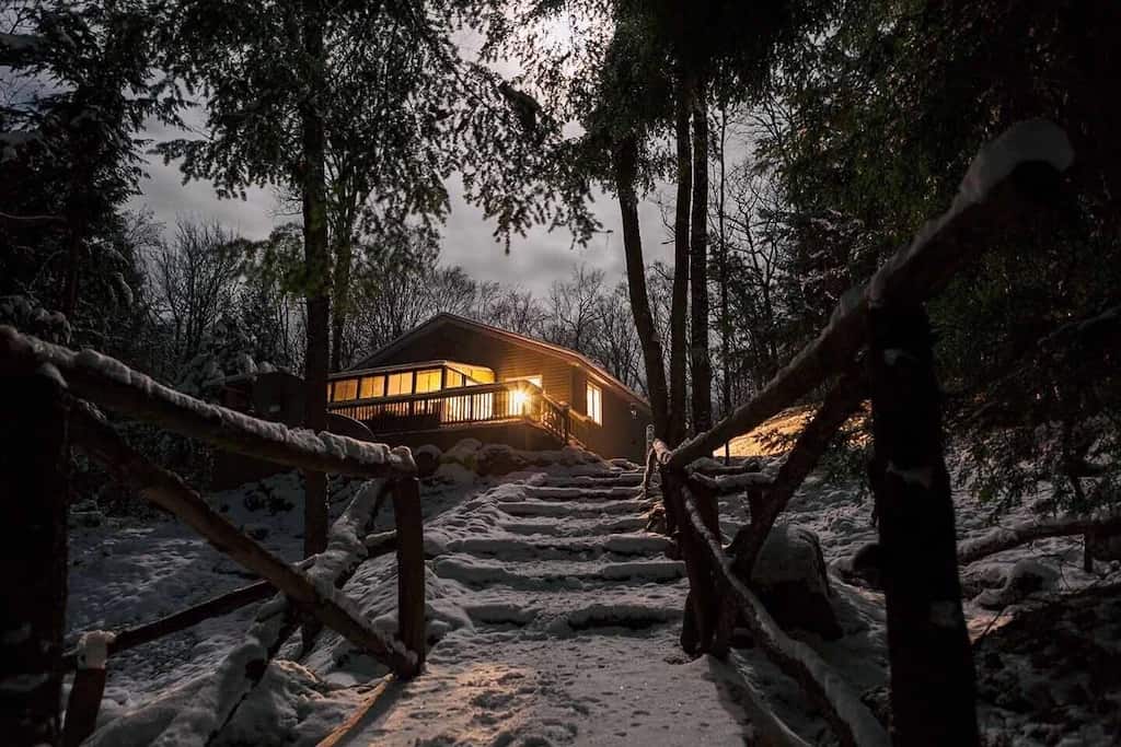 20 Top Airbnb Cottages in Muskoka for an Epic Getaway 16 Night time view of TuckAway cottage airbnb.