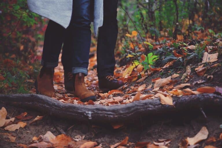 Canada in Autumn: 15 Reasons to Visit + Weather Guide 8 Two hikers during Canada in fall