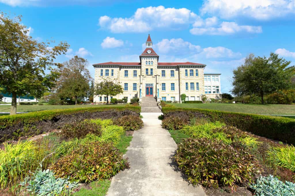 25 Things to Do in Elora, Ontario 6 The Wellington County Museum and Archives building beyond the front garden in Elora.