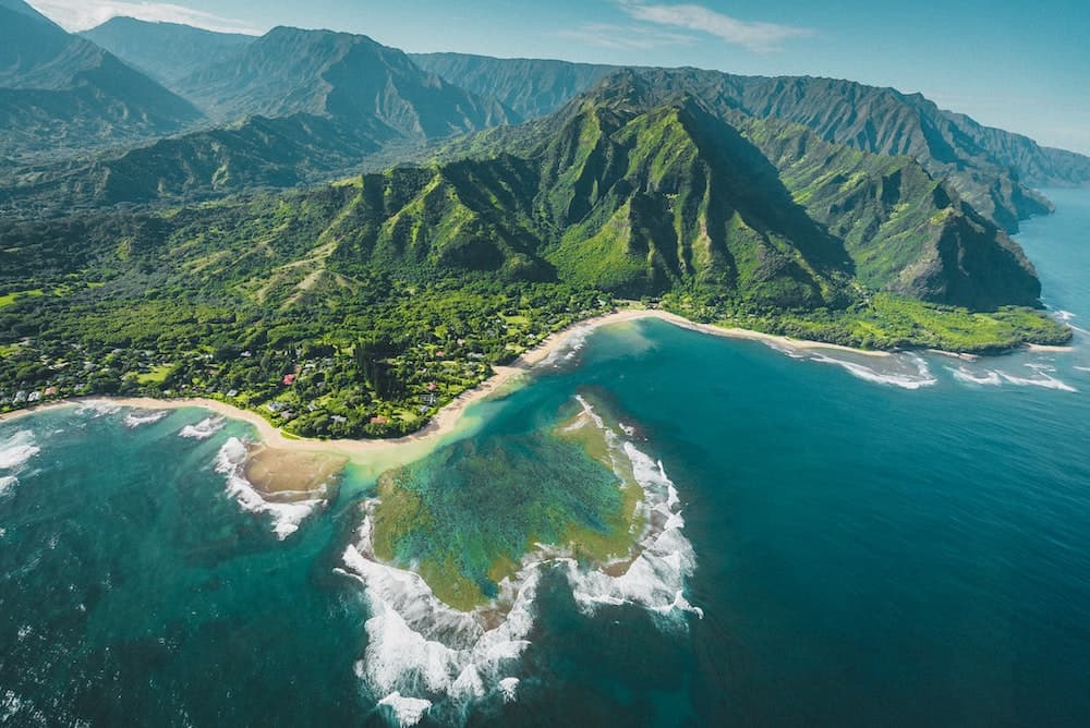 29 Pros and Cons of Living in Hawaii From an Expat 8 Hawaii islands from an aerials view with beaches and turquoise water
