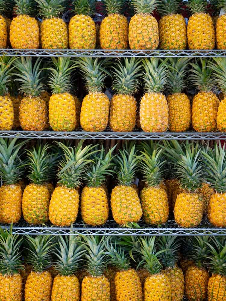 29 Pros and Cons of Living in Hawaii From an Expat 5 Pineapple listed on shelves in Hawaii