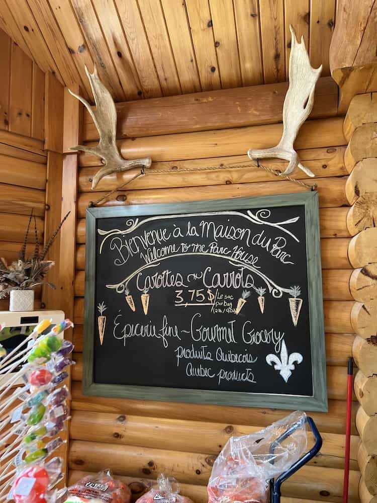 Chalkboard showing prices of carrots at parc omega in April 2022 at the Park House.