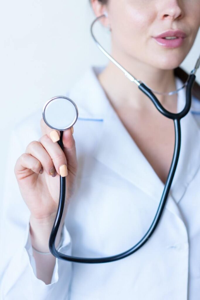 25 Pros and Cons of Living in Costa Rica in 2024 4 A female doctor in her lab coat is holding her black stethoscope in one of the hospitals Costa Rica.