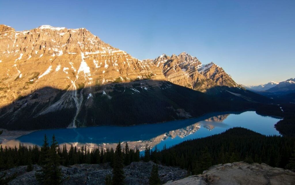 5 Best Banff Helicopter Tours (2024) 3 Helicopter view of Lake Louise in Banff NP during sunrise.