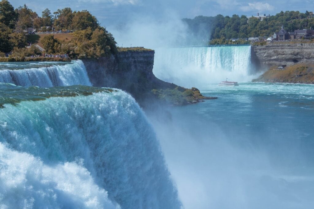 11 Awesome New York Niagara Falls Tours (2024) 3 Blue Waterfalls Near Green Trees