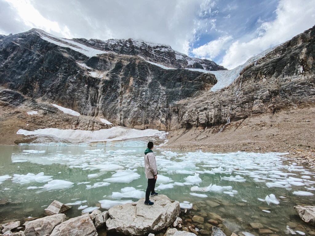 12 Best Jasper Helicopter Tours (2024) 11 Man Looking at the Mount Robson Mountains