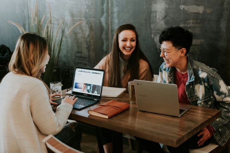 50+ Countries with Digital Nomad Visas in 2024 1 three people using their laptops in a coffee shop