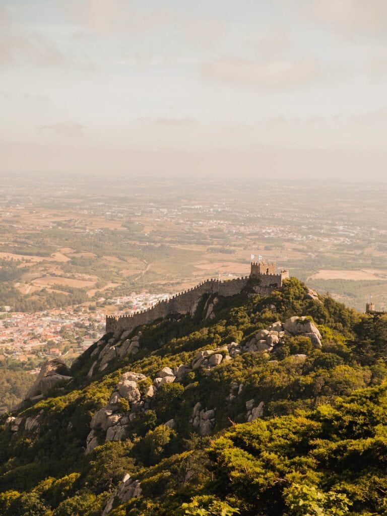 33 Living in Portugal Pros and Cons from an Expat 10 aerial photography of mountain under white sky in Porto, Portugal