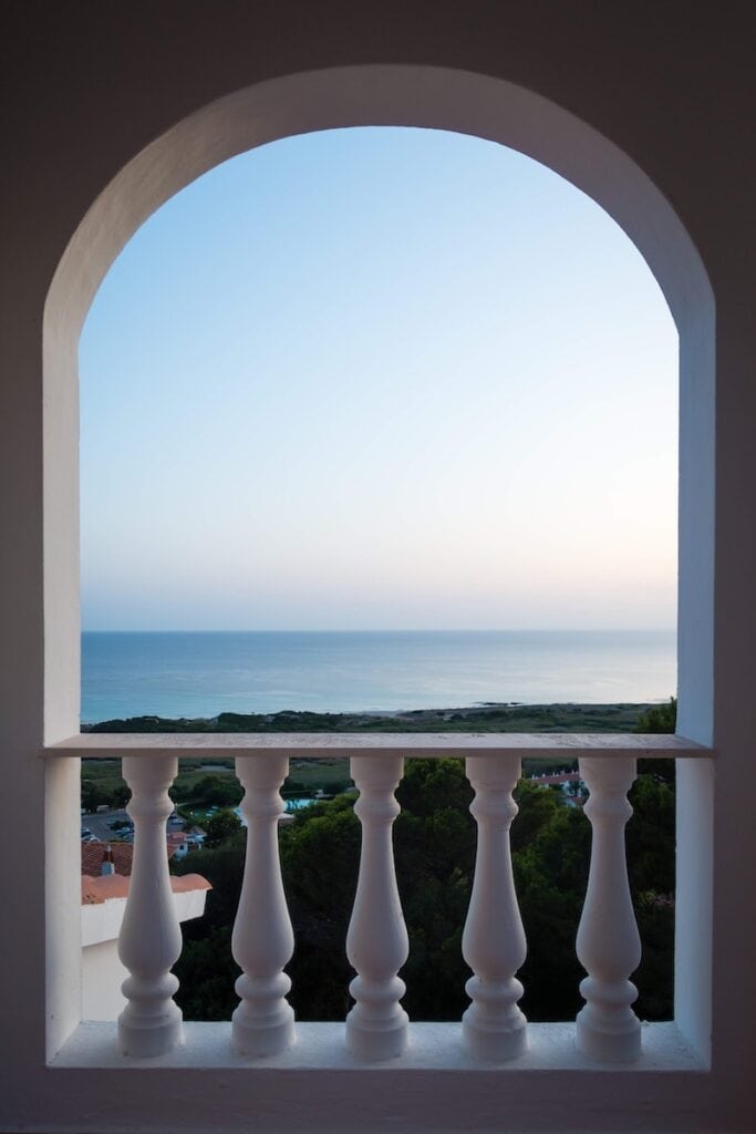 27 Pros and Cons of Living in Spain in 2024 9 View over the Spanish countryside and ocean from a terrace in Spain