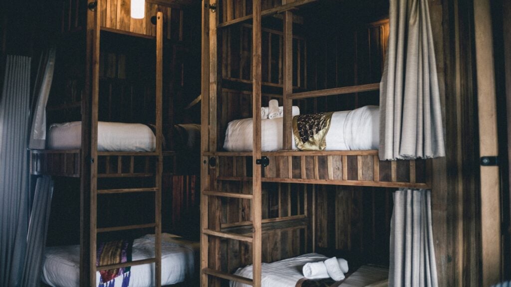 Where To Stay In Toronto: Best Areas And Hotels in 2024 25 brown wooden bunk beds