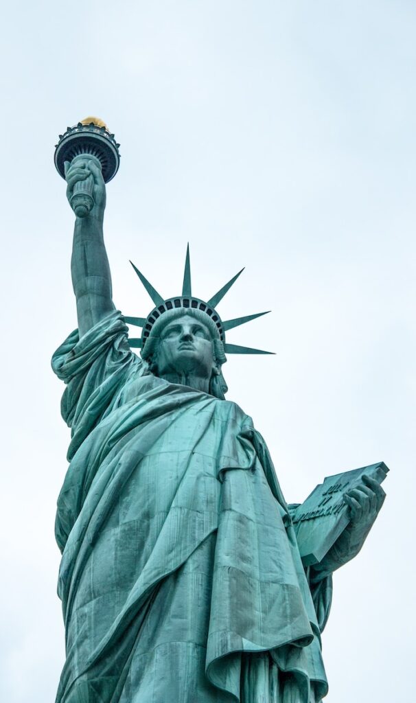 43 Pros And Cons Of Living In New York City in 2024 5 low angle photography of Statue of Liberty in New York City