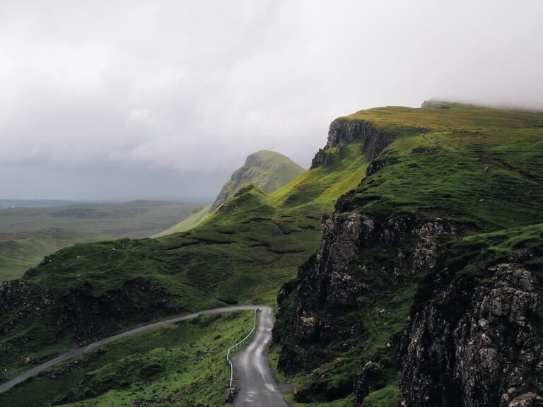 Renting a Car in Ireland: Top Things To Know in 2024 2 concrete road between mountains