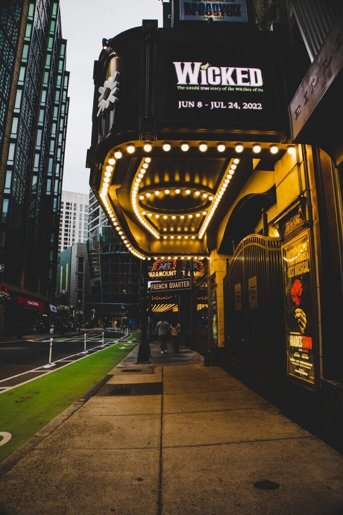 25 Pros and Cons of Living in Boston in 2024 3 "WIcked" theatre sign in Boston.