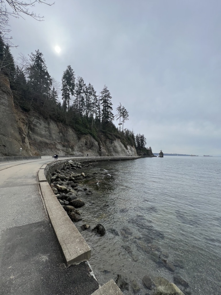 83 Bucket List Canada Things to Do in 2025 from a Canadian 27 Stanley Seawall wrapping around a cliff with the Pacific Ocean on the side.