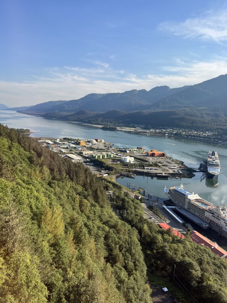 83 Bucket List Canada Things to Do in 2025 from a Canadian 34 View down from a mountain in Alaska looking at the cruise port and two cruise ships.
