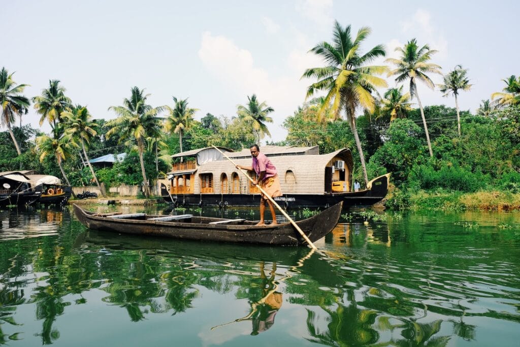 These Were the Most Popular Travel Destinations in 2023, According to Google Trends 6 man riding on boat during daytime in India.