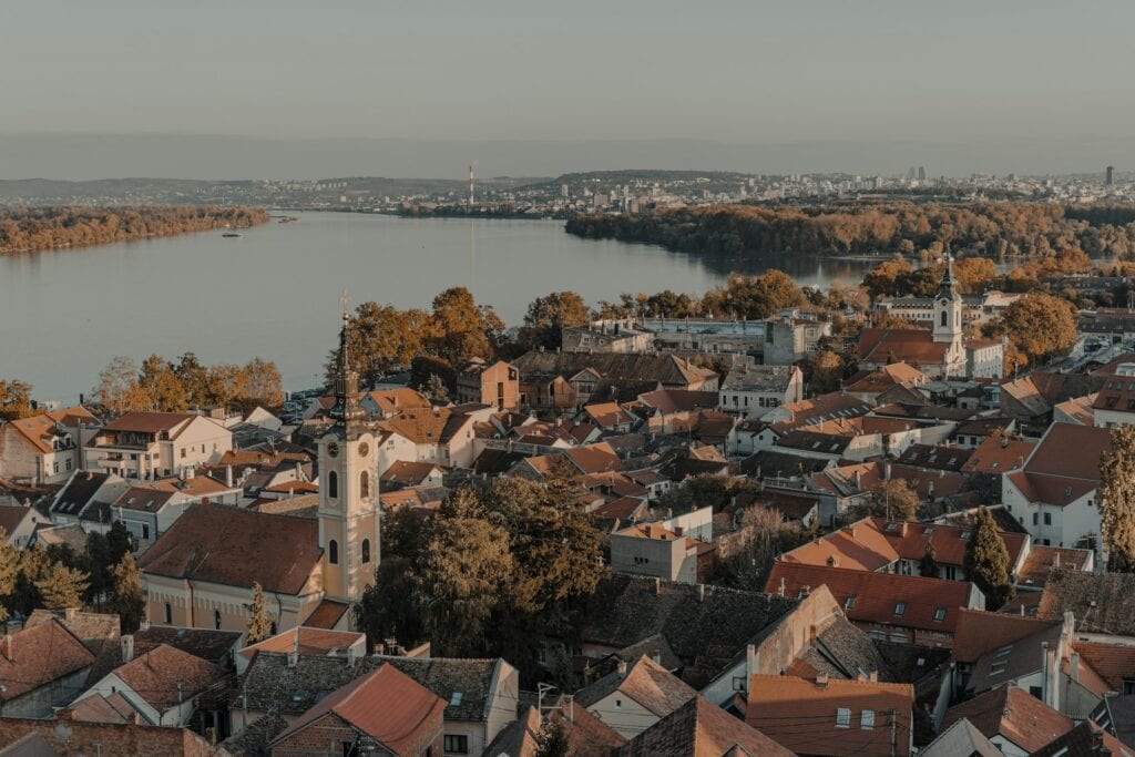 14 Top Freelance Visa Countries To Live And Work In 2024 8 An aerial view of the buildings and houses along the lake in Serbia.