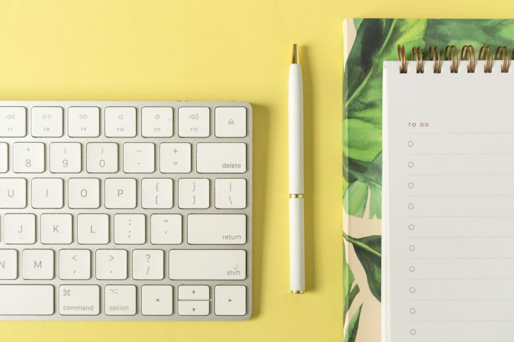 Top Side Hustle Ideas for Canadians from Someone Who's Done Them! 6 yellow flatlay keyboard notebook