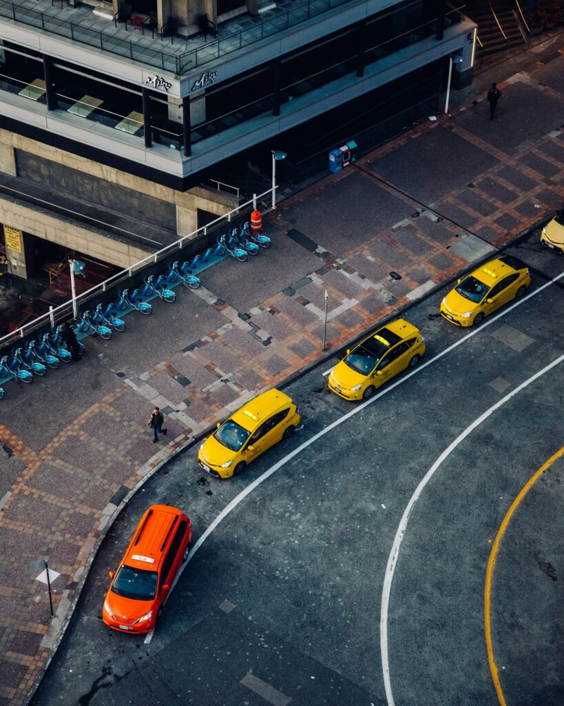 17 Pros and Cons of Retiring in Canada (From a Local) 8 Orange and yellow taxis lining up in Canada.