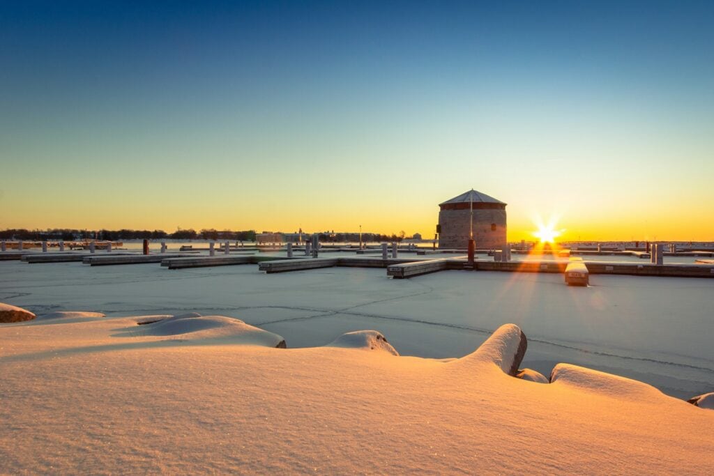 15 Best Places to Retire in Canada (From a Local Canadian!) 9 A harbour covered in snow during winter in Kingston.