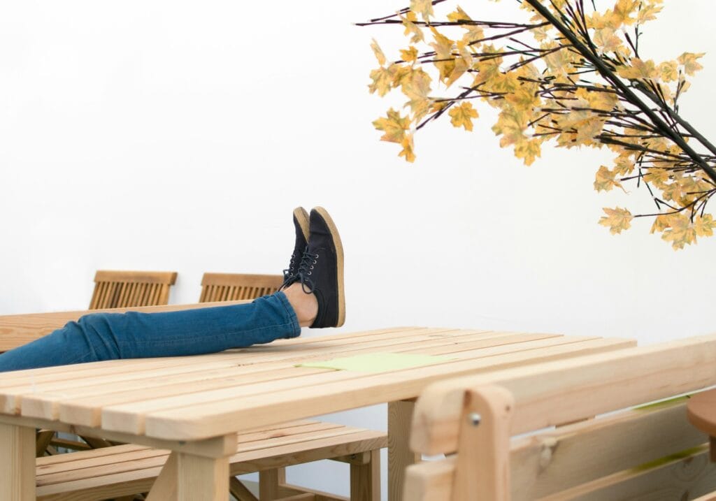 19 Reasons Not To Move To Australia In 2024 14 Feet resting on a wooden table.